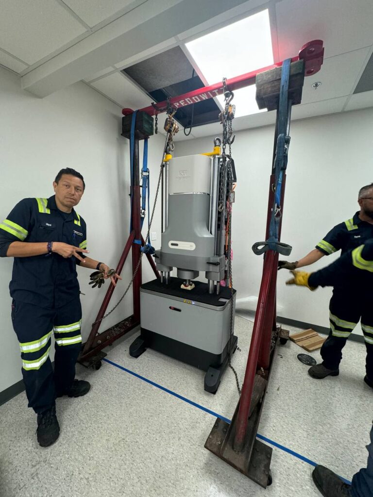Pedowitz Machinery Movers Miami Rigging Company Transporting Instrom Materials Testing Machine 2